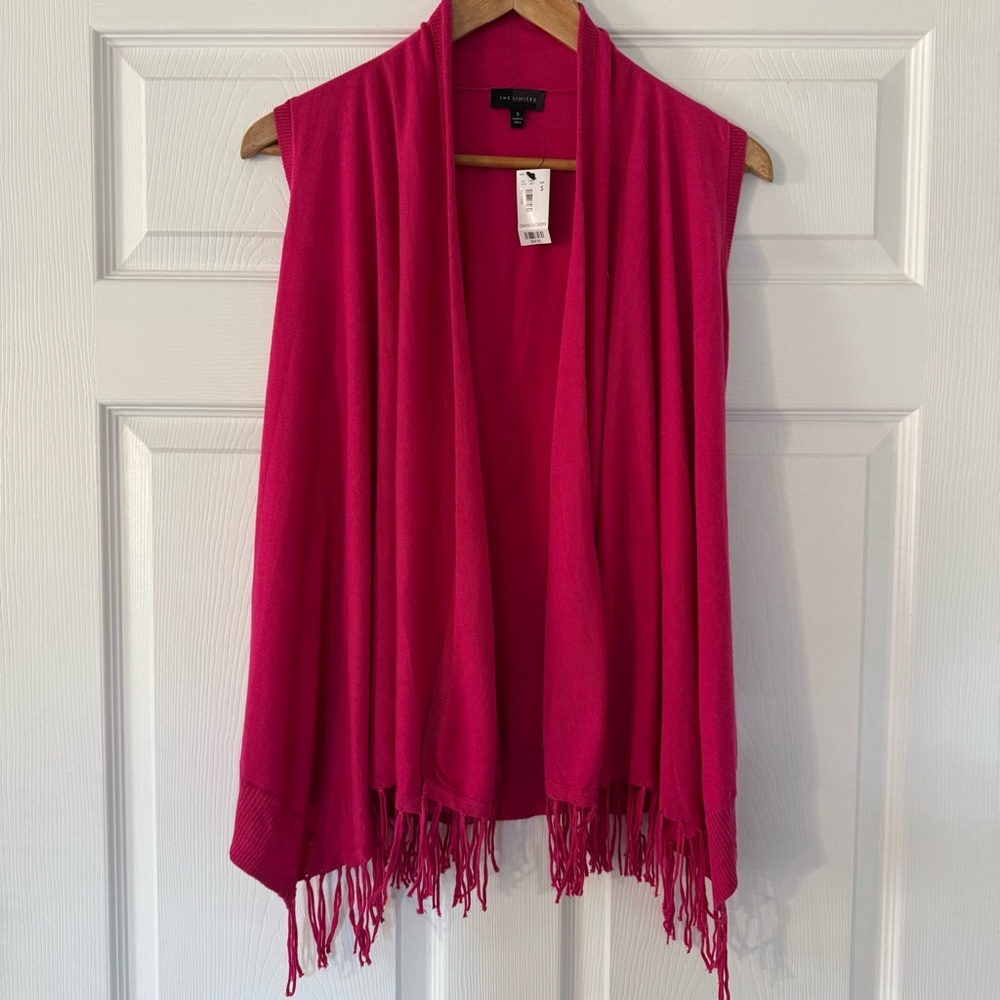 The limited fuchsia, pink cardigan vest